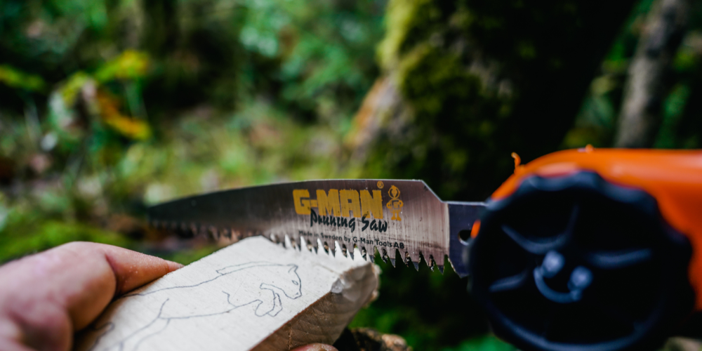 Axe vs. folding saw: which should you carry for camping?