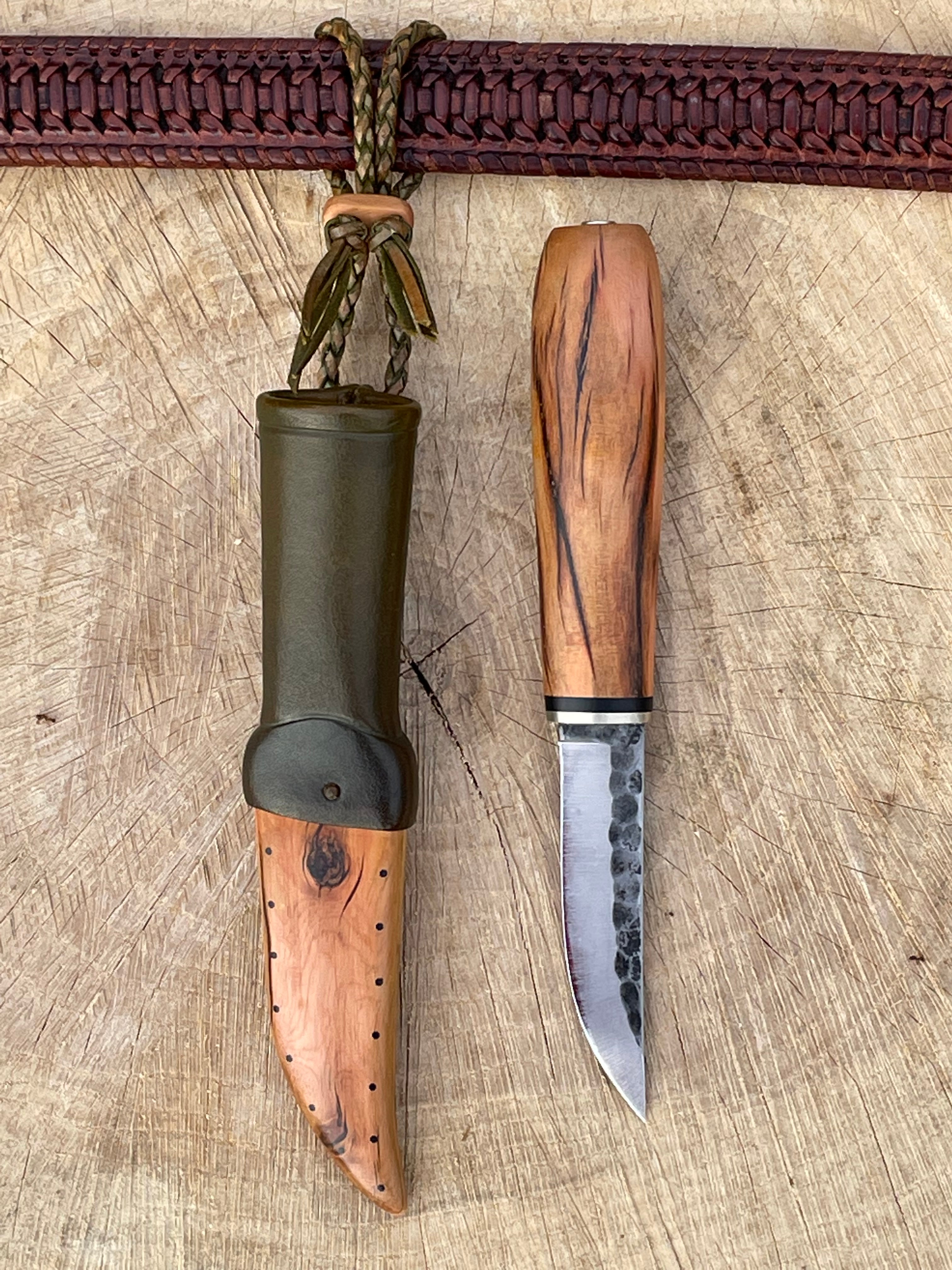 Leather knife scales made from epoxy laminated layers of real